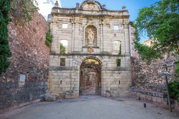 Naklejka premium The neoclassical façade of the entrance to the monastery. The ruins of the Carthusian monastery of Scala Dei, Cartoixa de Santa Maria d'Escaladei, the most important historical sites in Priorat. 