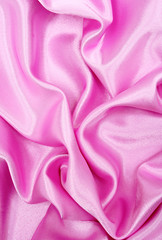 Smooth elegant pink silk as background