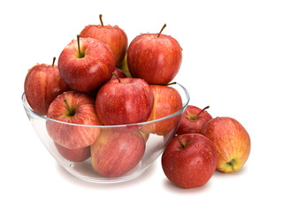 Crop of red apples in glass vase