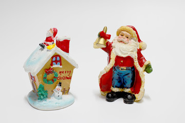 Santa Claus doll and gift decoration for merry christmas and happy new year isolated on white background.