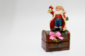 Santa Claus doll and gift decoration for merry christmas and happy new year isolated on white background.
