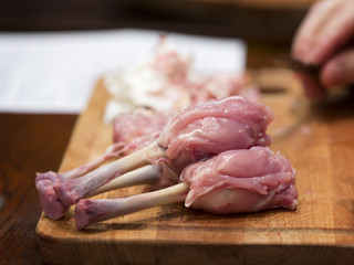 Cooking hot snack of chicken legs. Chicken legs inside-out for g