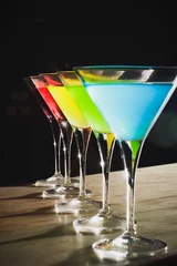 Papier peint photo autocollant rond Alcool Multicolored cocktails at the bar.