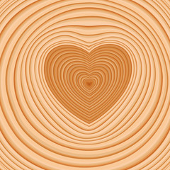 поперечный срез дерева с годовыми кольцами и темной сердцевиной в форме сердца © yulicon