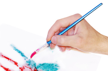Hand painting picture with brush artist