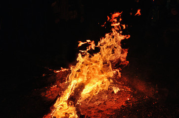 Night bonfire on the river