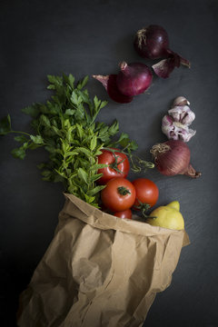 Fresh vegetables in paper bag 