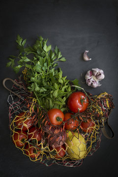 String bag with fresh vegetables 