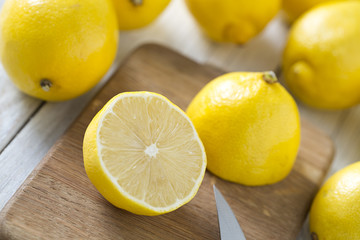 lemons on wooden surface