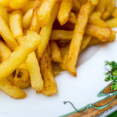 Golden French fries potatoes ready to be eaten