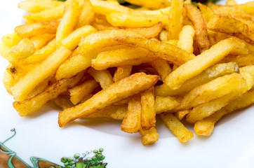 Golden French fries potatoes ready to be eaten