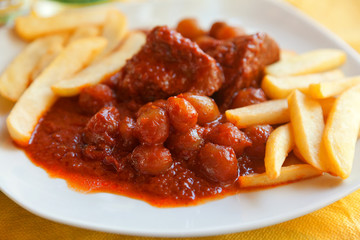 Beef Stifado. Crete style stew. French fries for side dish. Hori