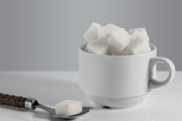 A cup with lump sugar