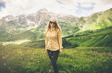 Naklejka premium Young Woman hiking Travel Lifestyle concept Summer vacations outdoor rocky mountains on background