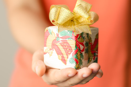 Gift box holding by hand for giving