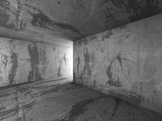 Dark concrete basement room interior with exit light. 