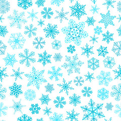 Seamless pattern of snowflakes, light blue on white