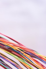 Colorful cable on grey metal surface
