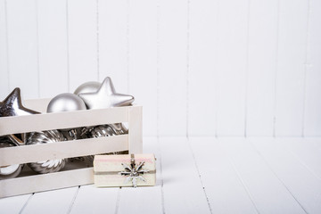 Fototapeta na wymiar Christmas decoration over white striped background - selective focus, copy space