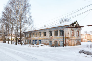old red brick building in the winter in central Russia