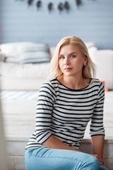 Fototapeta premium Blond lady against blurred background