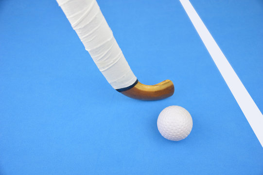 hockey stick hitting the ball
