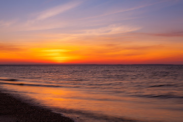 Stunning sunset on the empty beach, Cape Cod, USA