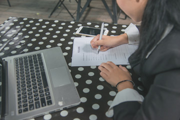 business woman fill out resume forms