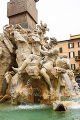 Fototapeta na wymiar Fountain of the four rivers with an egyptian obelisk, Italy, Rome, Navon Square