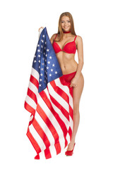 Beautiful girl in bikini holding the USA flag