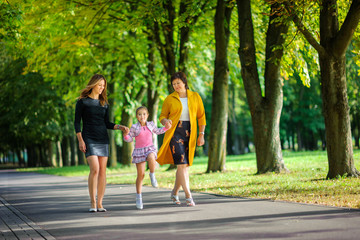 Obraz premium girl with mother and grandmother