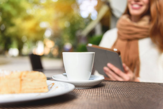 Cheerful girl resting in cafeteria - Powered by Adobe