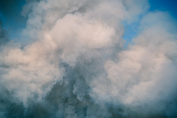 Fluffy Puffs of Smoke and Fog on Black Background. smoke background. smoke and cloud. Artistic abstraction composed of nebulous.