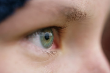 green teen girl eye closeup front view outdoor