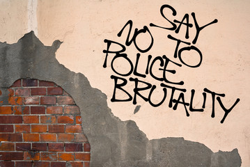 Say No To Police Brutality - handwritten graffiti sprayed on the wall - critique and fight against cops and their misusing of power, brutal and excessive violence and assault