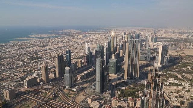 Dubai downtown and Persian Gulf, United Arab Emirates. View on skyscrapers on Sheikh Zayed road, financial district and Persian Gulf  from the 124th floor of Burj Khalifa skyscraper in Dubai