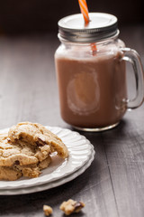 Homemade chocolate chip oatmeal cookies with hot chocolate