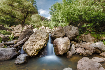 Fototapeta premium View of beautiful mountain waterfall. Exploring Armenia