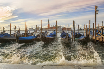 Fototapeta na wymiar venetian gondolas in Venice