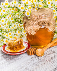 Still life with honey, honeycomb, pollen and propolis