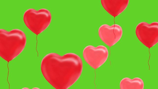 red balloons in the shape of a heart, green screen, green background