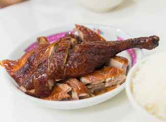 Roast duck, Chinese style on the white dish closeup