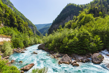 Fototapeta na wymiar Landscape in Abkhazia with Caucasian ridge and river
