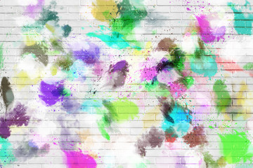 Paint and ink on a brick wall, colorful background.