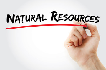 Hand writing Natural resources with marker, concept background