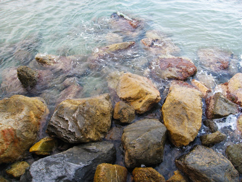 Fototapeta stones at the sea shore close-up. Ocean and rocks
