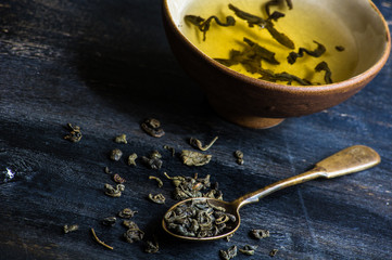 Green tea on wooden table