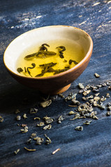 Green tea on wooden table