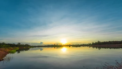 Foto op Canvas Beautiful sunset over lake © peangdao