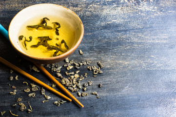 Green tea on wooden table